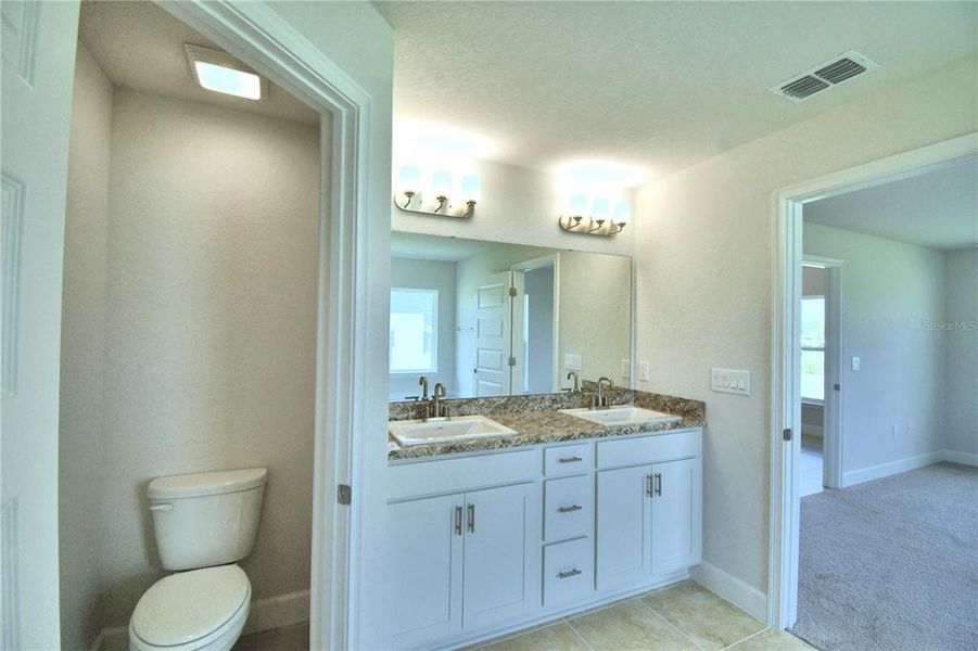 Furnished interior view inside a new home in Cadence Crossing, Auburndale (Image 8).