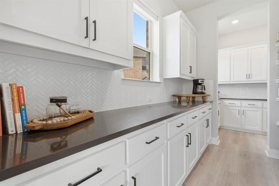 The Expansive Butler's Pantry And Coffee Bar Is Ideal For Entertaining, And Look At All This Additional Storage Space!