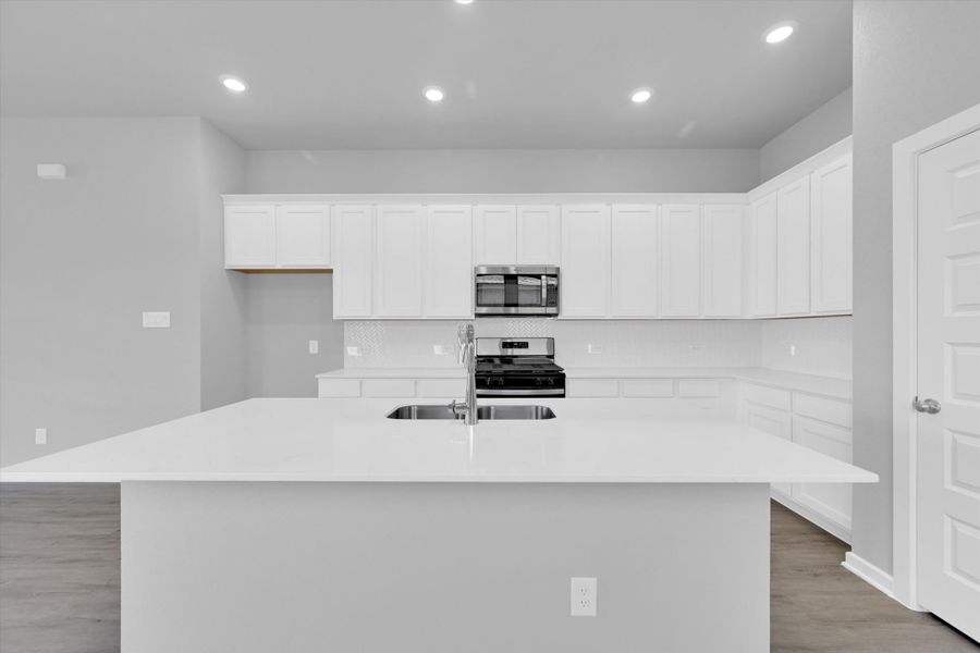 Furnished interior view inside a new home in Sunterra 40, Katy (Image 8).