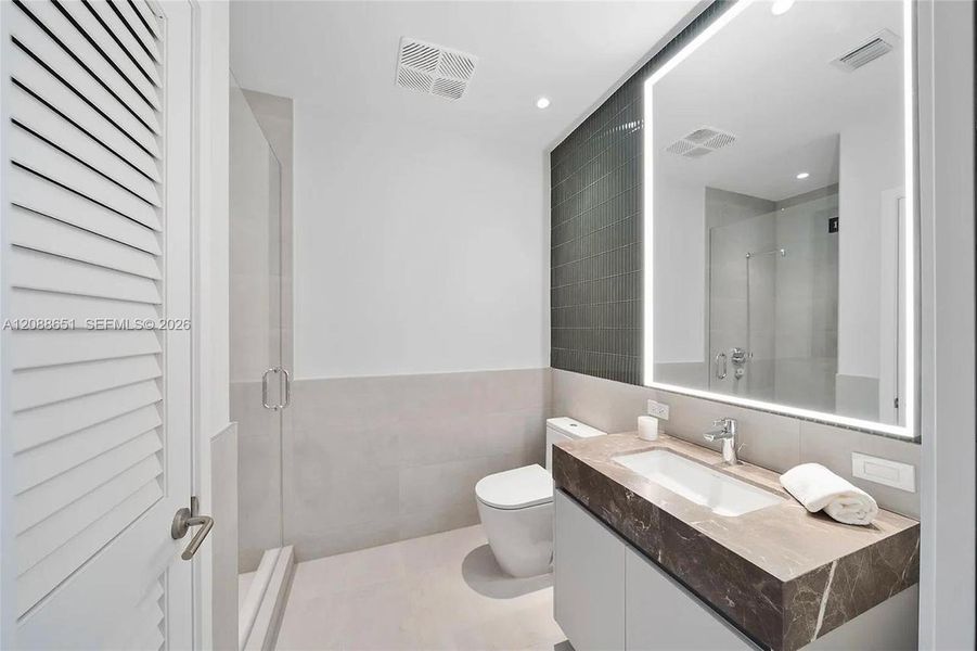 Furnished interior view inside a new home in , Miami Beach (Image 14). Furnished interior view inside a new home in , Miami Beach (Image 14).