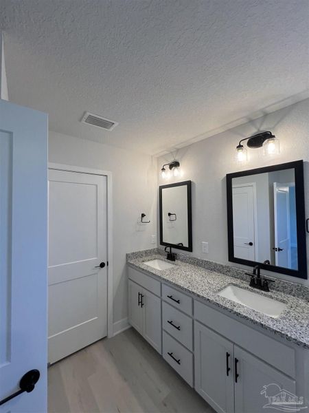 Furnished interior view inside a new home in Allison Acres, Cantonment (Image 8). Furnished interior view inside a new home in Allison Acres, Cantonment (Image 8).