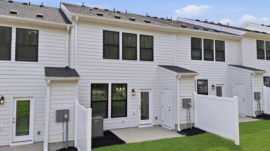 Exterior details and patio area of a home in Gresham Station, Simpsonville (Image 4).