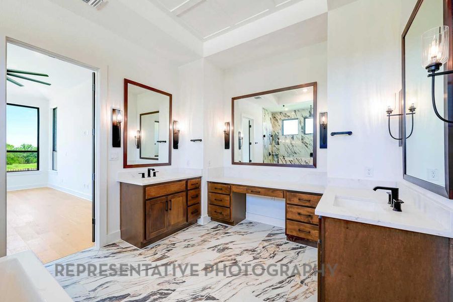 Full bath with two sinks, vanity, a marble finish shower, light marble finish flooring, and a bathtub Full bath with two sinks, vanity, a marble finish shower, light marble finish flooring, and a bathtub