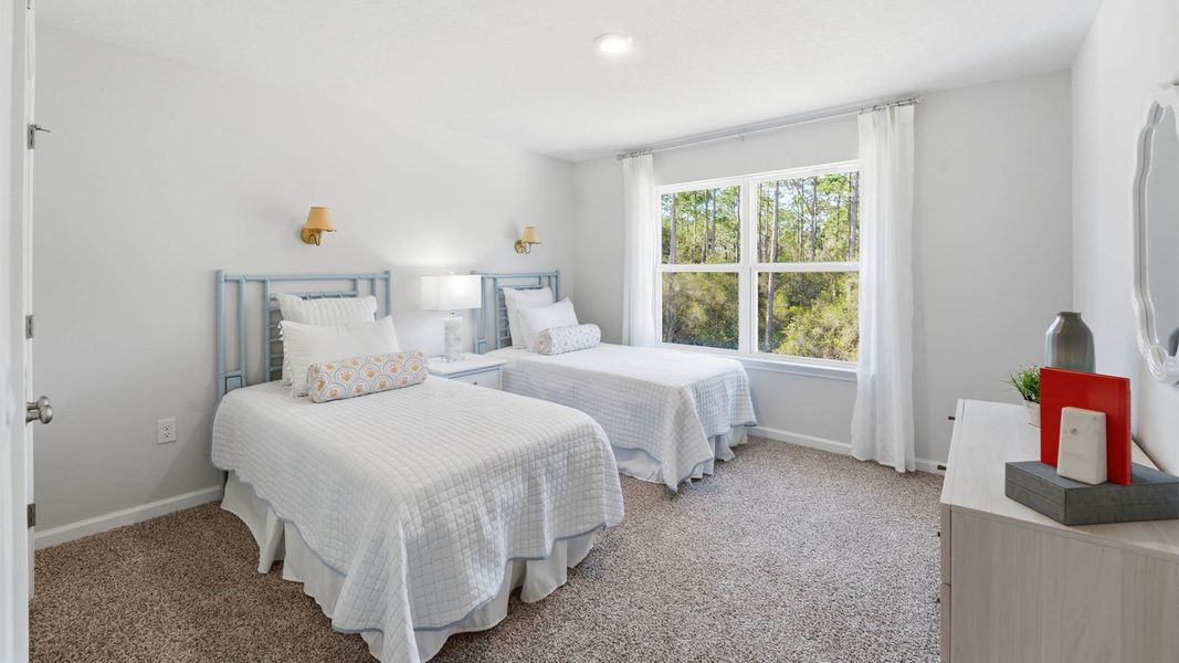 Representative furnished interior of a home built from the The Monroe by D.R. Horton in Chateau Nemours, Port Saint Joe (Image 19).
