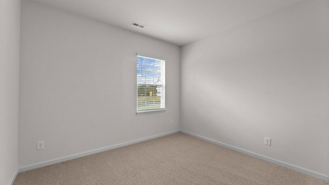 Spacious, unfurnished interior of a new home in Beaver Dam Crossing, Bailey (Image 24).