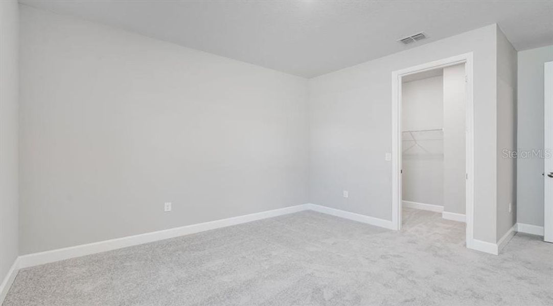 Spacious, unfurnished interior of a new home in The Cove at West Port, Port Charlotte (Image 24).