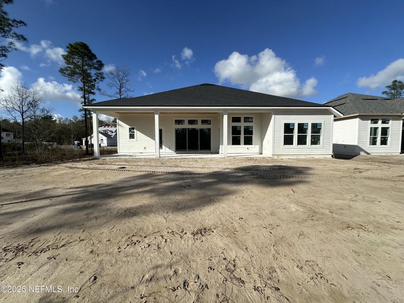 Exterior details and patio area of a home in SilverLeaf, St. Augustine (Image 3).