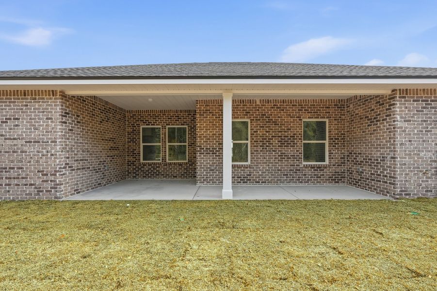 Exterior details and patio area of a home in Southern Charm, Crestview (Image 28).