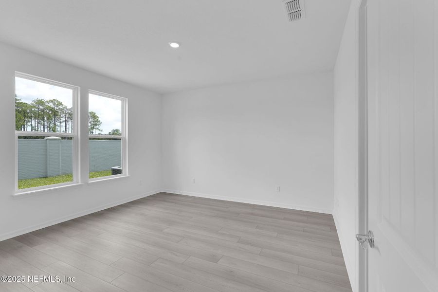 Spacious, unfurnished interior of a new home in Summer Bay at Grand Oaks, St. Augustine (Image 27). Spacious, unfurnished interior of a new home in Summer Bay at Grand Oaks, St. Augustine (Image 27).