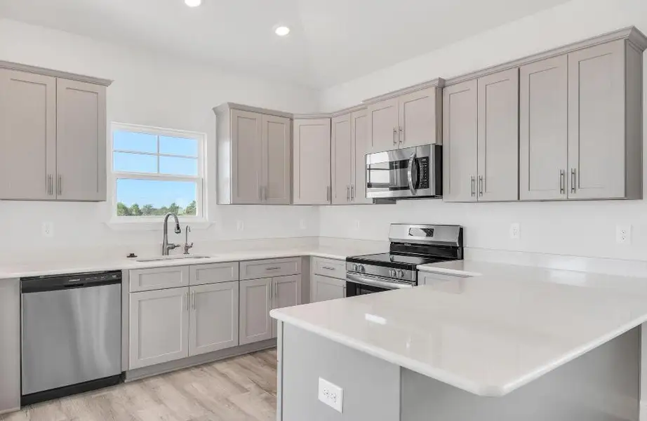 Furnished interior view inside a new home in The Bluffs at Lafayette, Freeport (Image 3).