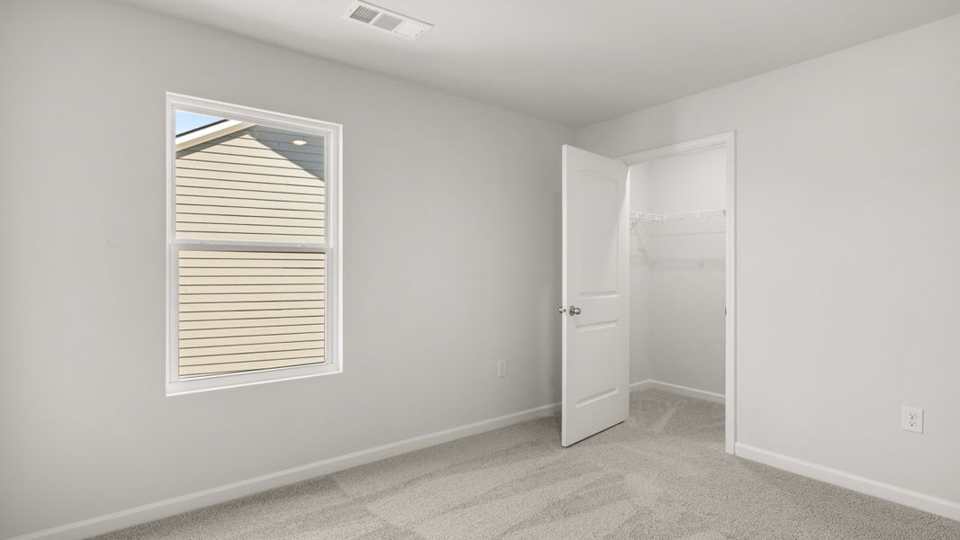 Representative unfurnished interior of a home built from the Belfort by D.R. Horton in Hamptons at Riverwood North, Dallas (Image 22).