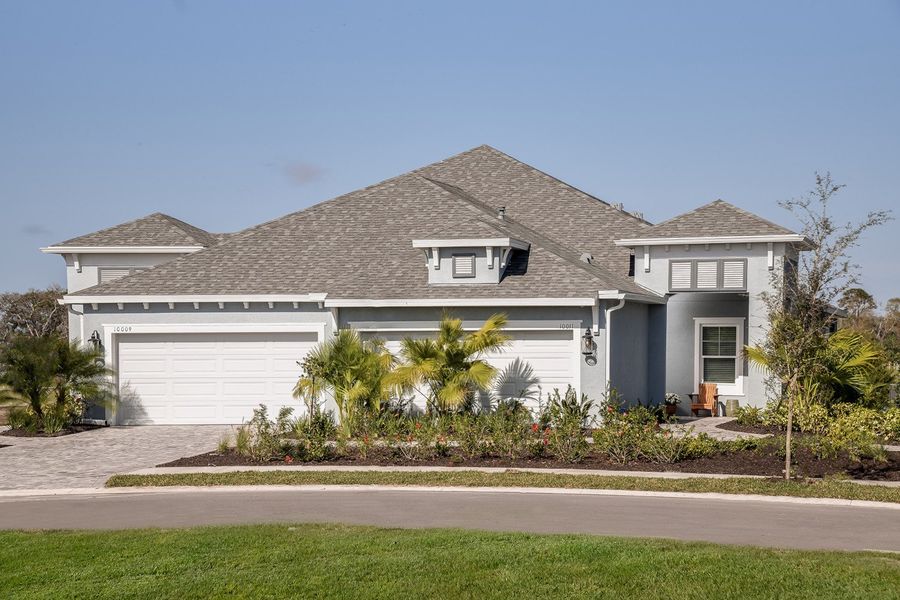 Representative exterior photo of a completed home built from the Tidewater 2 by Neal Communities in Wildleaf, Parrish, FL (Image 2). Representative exterior photo of a completed home built from the Tidewater 2 by Neal Communities in Wildleaf, Parrish, FL (Image 2).