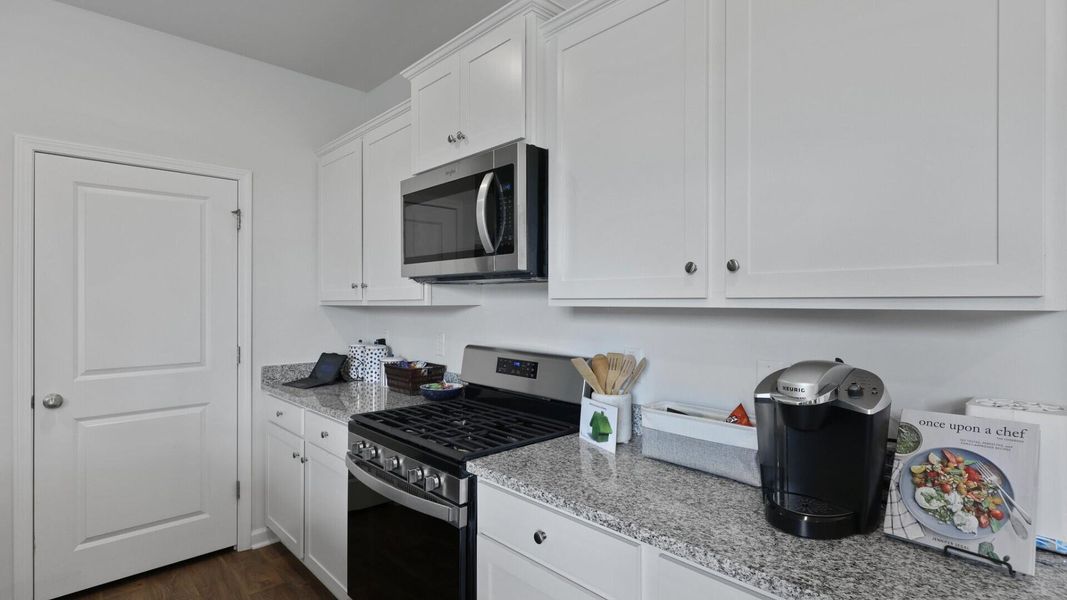 Furnished interior view inside a new home in Pine Hills at Cane Bay, Summerville (Image 5). Furnished interior view inside a new home in Pine Hills at Cane Bay, Summerville (Image 5).