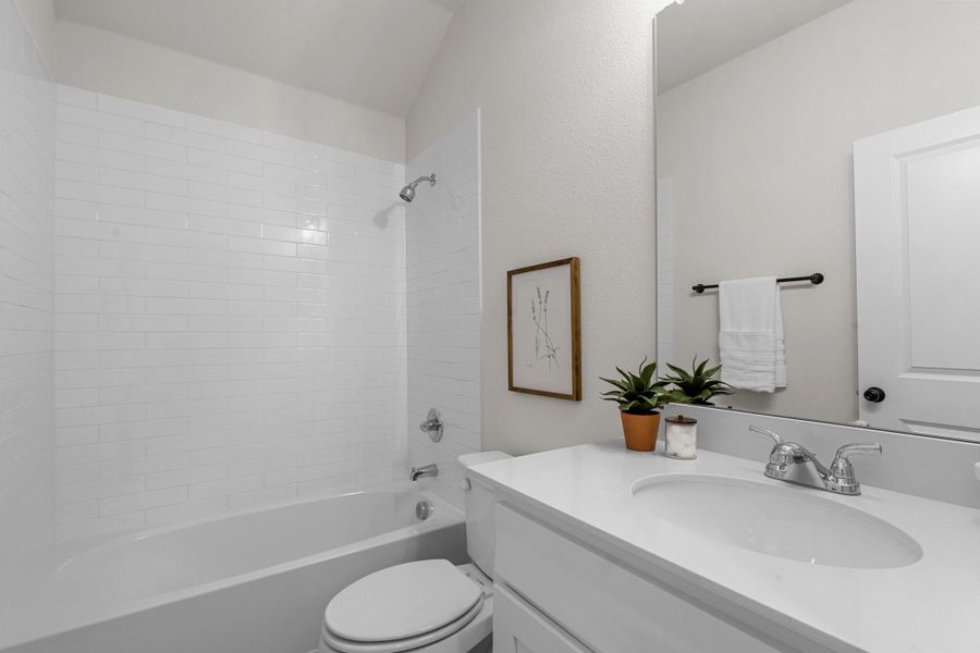 Representative furnished interior of a home built from the Essex by Cheldan Homes in Stoneview, Glen Rose (Image 6).