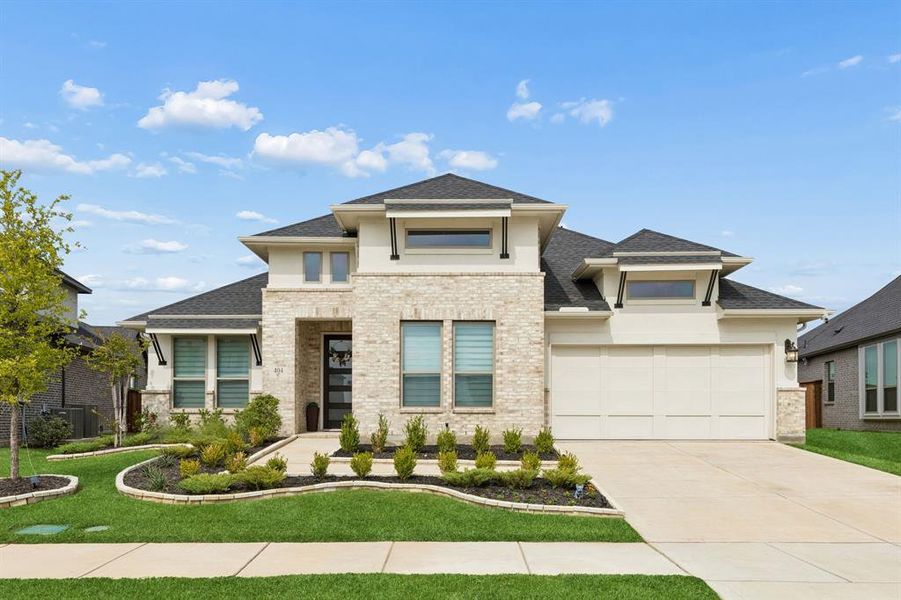 Front exterior of a new home in Dominion of Pleasant Valley, Wylie, TX, highlighting curb appeal (Image 1). Front exterior of a new home in Dominion of Pleasant Valley, Wylie, TX, highlighting curb appeal (Image 1).