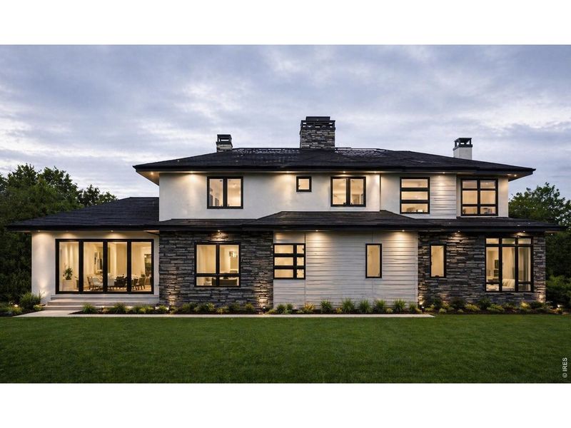 Front exterior of a new home in , Longmont, CO, highlighting curb appeal (Image 5).