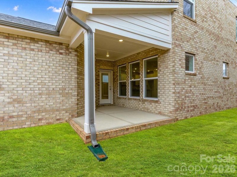 Exterior details and patio area of a home in Whitley Preserve – Park Collection, Mint Hill (Image 17).