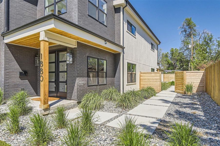 Front exterior of a new home in , Denver, CO, highlighting curb appeal (Image 24).