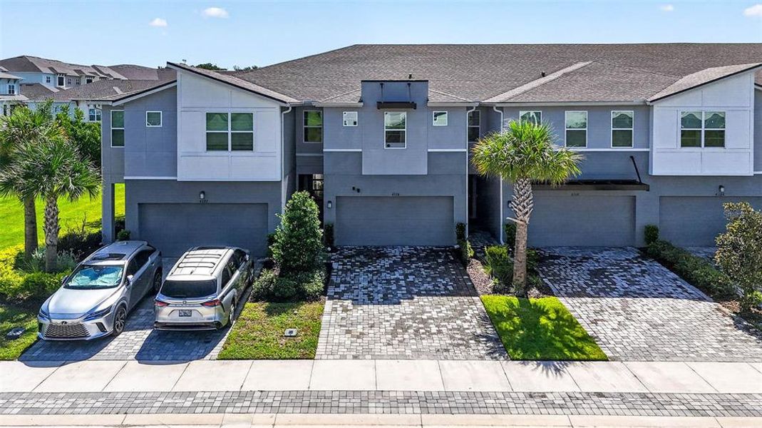 Front exterior of a new home in , Lutz, FL, highlighting curb appeal (Image 31).
