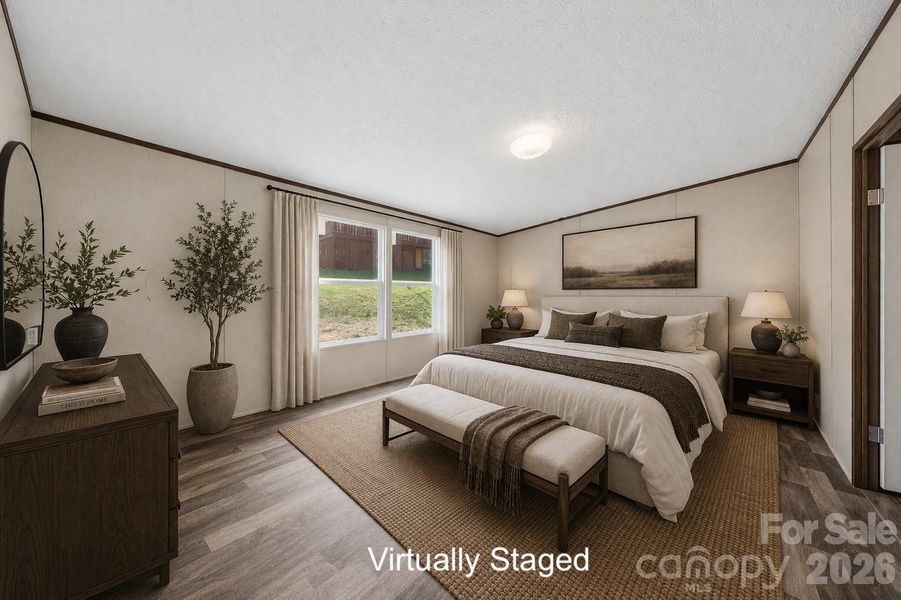 Virtually staged primary bedroom Virtually staged primary bedroom