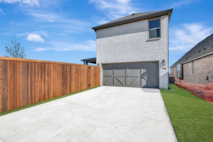Exterior details and patio area of a home in Lilybrooke at Legacy Hills, Celina (Image 24).