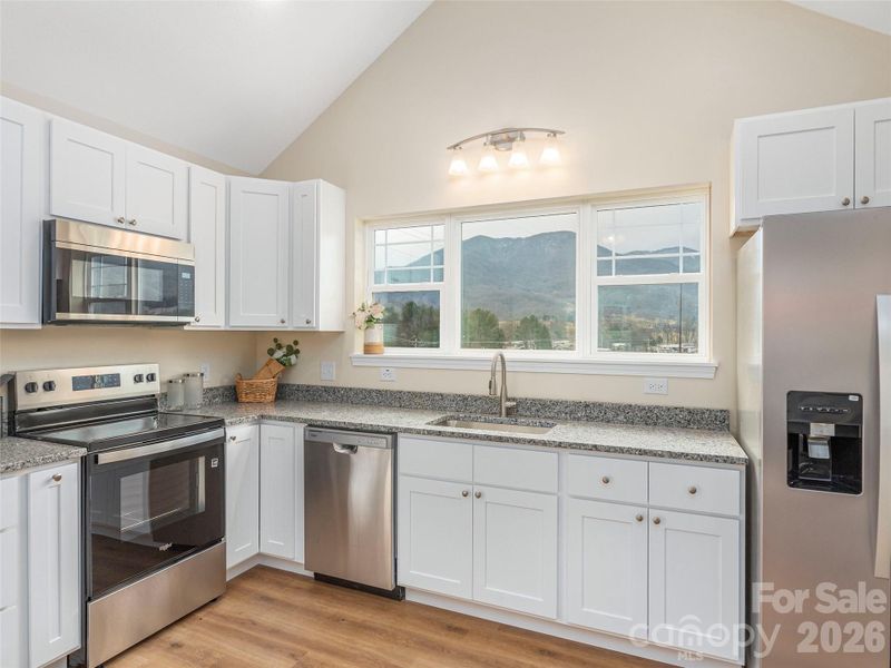 Furnished interior view inside a new home in , Waynesville (Image 6).