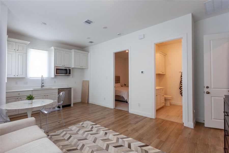 This apartment joins the main house through the laundry room.....a functional and inviting layout.
