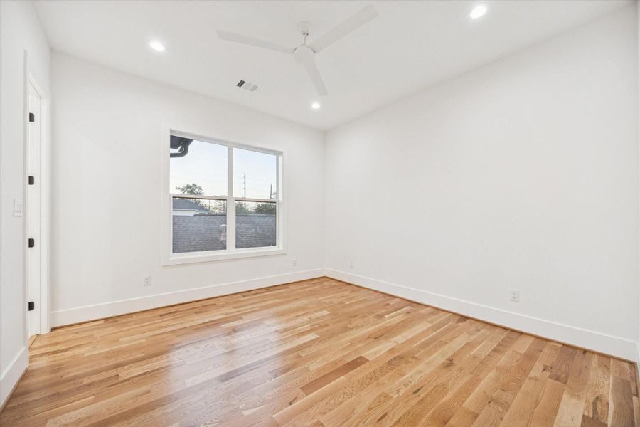 Bright windows and clean lines give this secondary bedroom a flexible layout suited for guests, family, or a dedicated home office. Generous floor space, ceiling fan, and easy access to a nearby bath support comfortable daily use without wasted square footage. Bright windows and clean lines give this secondary bedroom a flexible layout suited for guests, family, or a dedicated home office. Generous floor space, ceiling fan, and easy access to a nearby bath support comfortable daily use without wasted square footage.