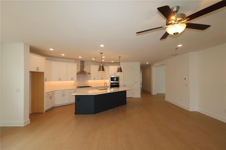 Furnished interior view inside a new home in Maple Grove at Towne Lake, Woodstock (Image 4).