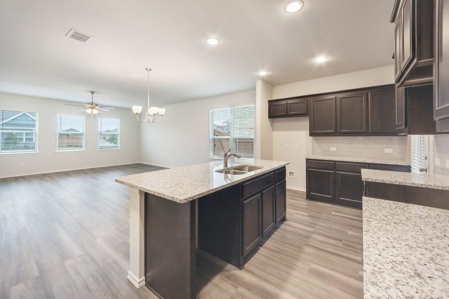 Representative exterior photo of a completed home built from the Harwood by Impression Homes in Heartland, Heartland, TX (Image 10).