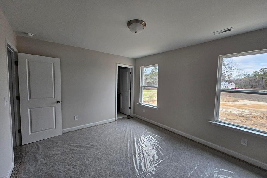 Spacious, unfurnished interior of a new home in Wellers Knoll, Lillington (Image 24). Spacious, unfurnished interior of a new home in Wellers Knoll, Lillington (Image 24).