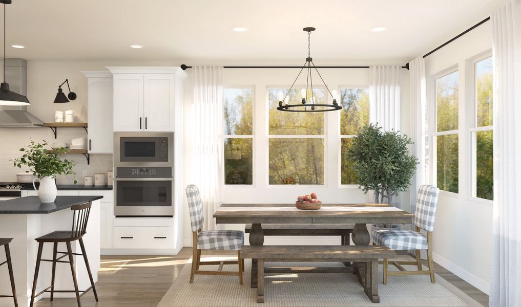 Cozy dining area with kitchen adjacent for easy entertaining