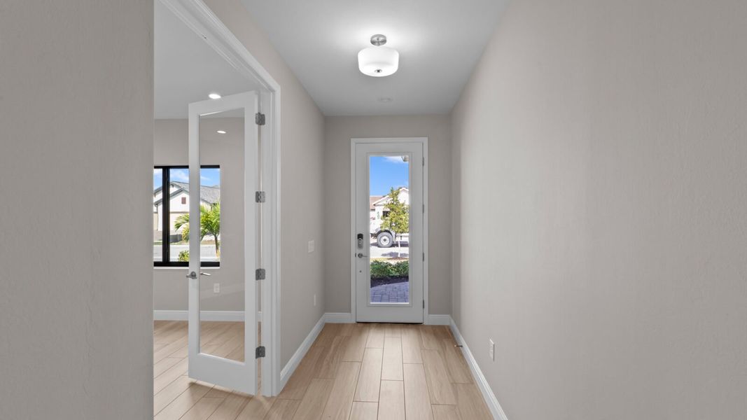 Spacious, unfurnished interior of a new home in SkySail, Naples (Image 12).