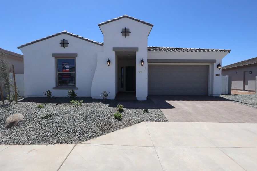 Front exterior of a new home in Alston at Soleo, San Tan Valley, AZ, highlighting curb appeal (Image 1). Front exterior of a new home in Alston at Soleo, San Tan Valley, AZ, highlighting curb appeal (Image 1).