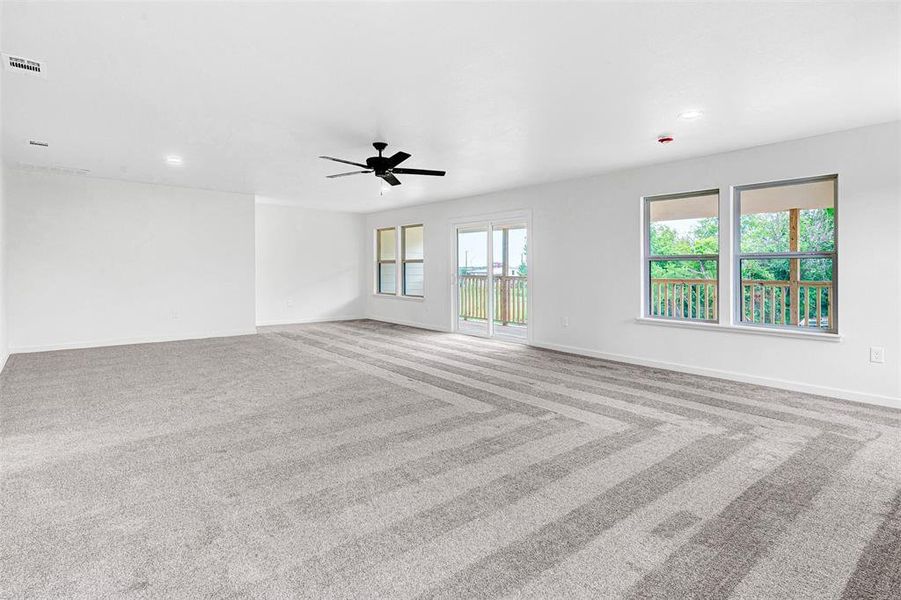 Upstairs bonus/flex room - door to balcony