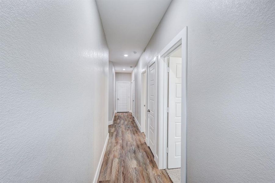 Hall featuring hardwood / wood-style floors