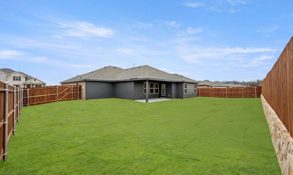 Representative exterior photo of a completed home built from the Walden II by Impression Homes in Stone Eagle, Azle, TX (Image 25).