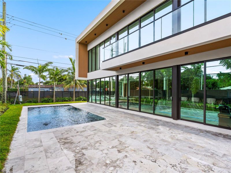 Exterior details and patio area of a home in , Miami (Image 21). Exterior details and patio area of a home in , Miami (Image 21).