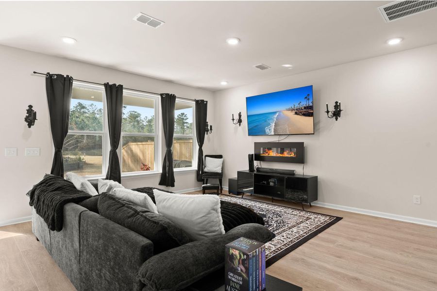Furnished interior view inside a new home in Jasmine Point at Lakes of Cane Bay, Summerville (Image 6).