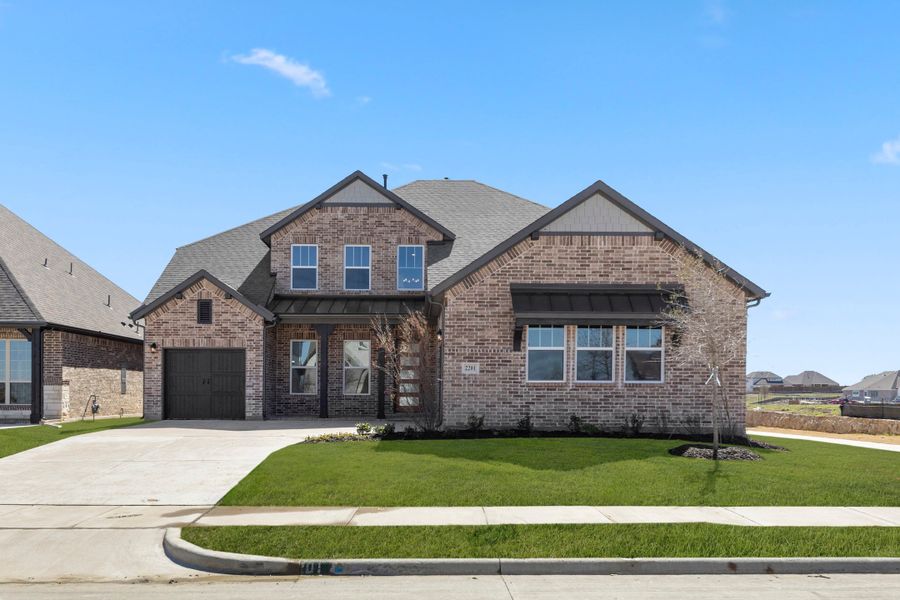 Representative exterior photo of a completed home built from the Louis - 70 ft Home Site by Rockwell Homes in Nelson Lake Estates, Rockwall, TX (Image 29). Representative exterior photo of a completed home built from the Louis - 70 ft Home Site by Rockwell Homes in Nelson Lake Estates, Rockwall, TX (Image 29).