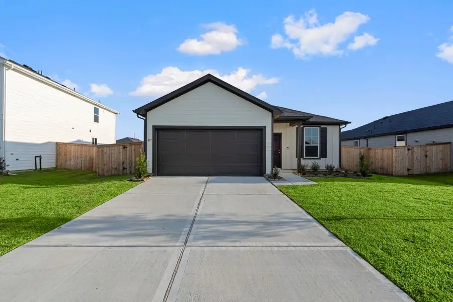 Front exterior of a new home in Windcress, Baytown, TX, highlighting curb appeal (Image 1). Front exterior of a new home in Windcress, Baytown, TX, highlighting curb appeal (Image 1).