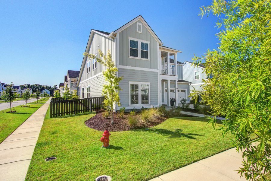 Front exterior of a new home in , Summerville, SC, highlighting curb appeal (Image 27).