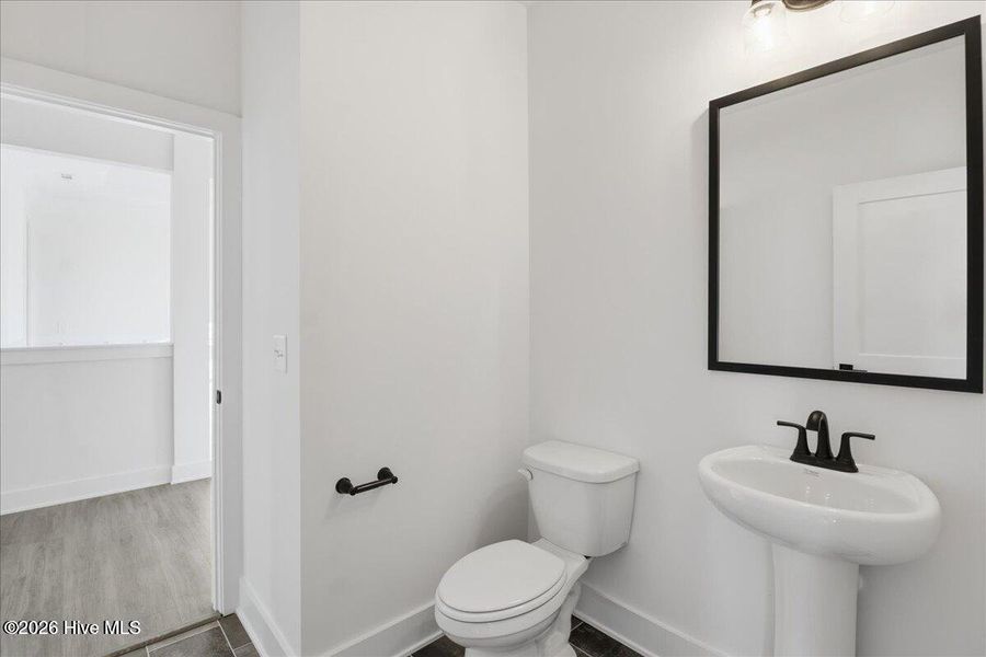 Furnished interior view inside a new home in Wood Creek, Leland (Image 7).