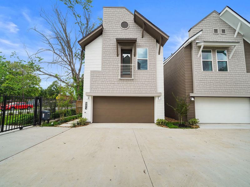 Discover modern living in this beautifully designed community home, showcasing a sleek exterior, spacious driveway, and lush surroundings—perfect for your next chapter.Photo Disclaimer: Photos are representative of the community and may depict a similar floor plan, model home, or previously completed residence.