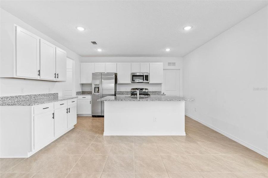 Furnished interior view inside a new home in , Winter Garden (Image 5).