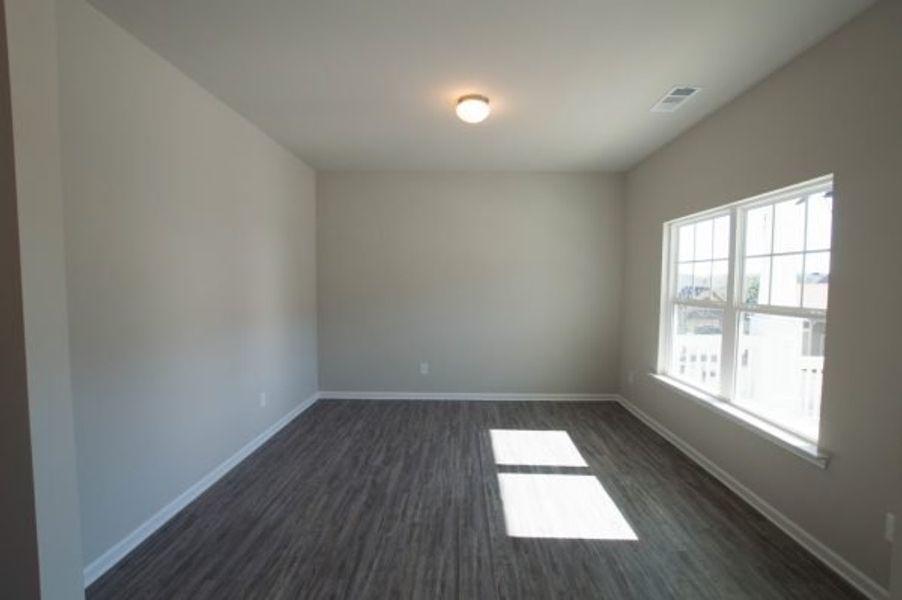 Representative unfurnished interior of a home built from the Crofton by Piedmont Residential in Hampton Ridge, Jefferson (Image 11).