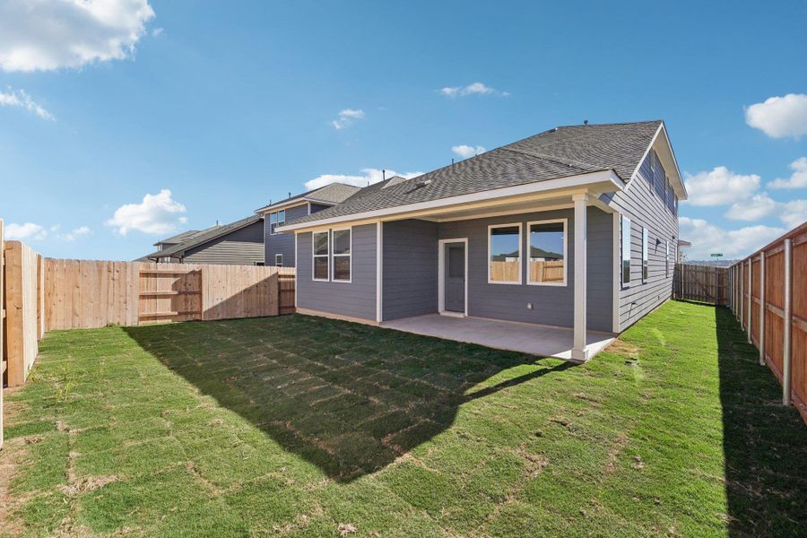Exterior details and patio area of a home in The Homestead at Lariat, Liberty Hill (Image 3).