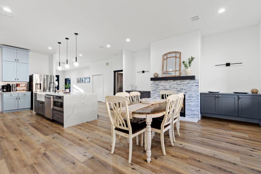 Dining space featuring recessed lighting and light wood-type flooring