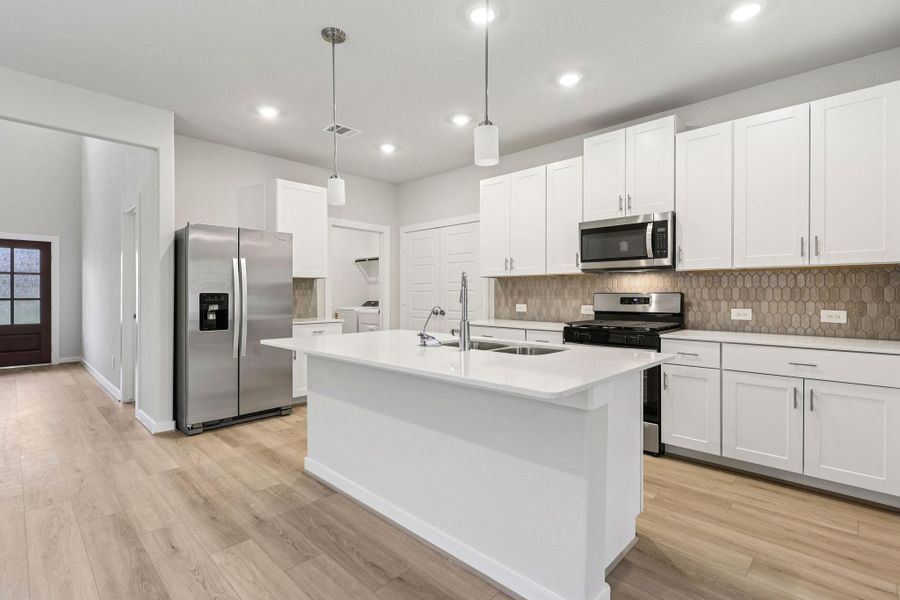 Photo is not of the actual home, but is an inspirational photo of builder’s model home and may depict options, furnishings, and/or decorator features that are not included