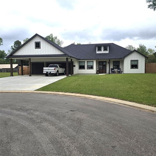 FRONT ELEVATION AND 3 CAR CARPORT ON A CUL-DE-SAC LOT FRONT ELEVATION AND 3 CAR CARPORT ON A CUL-DE-SAC LOT